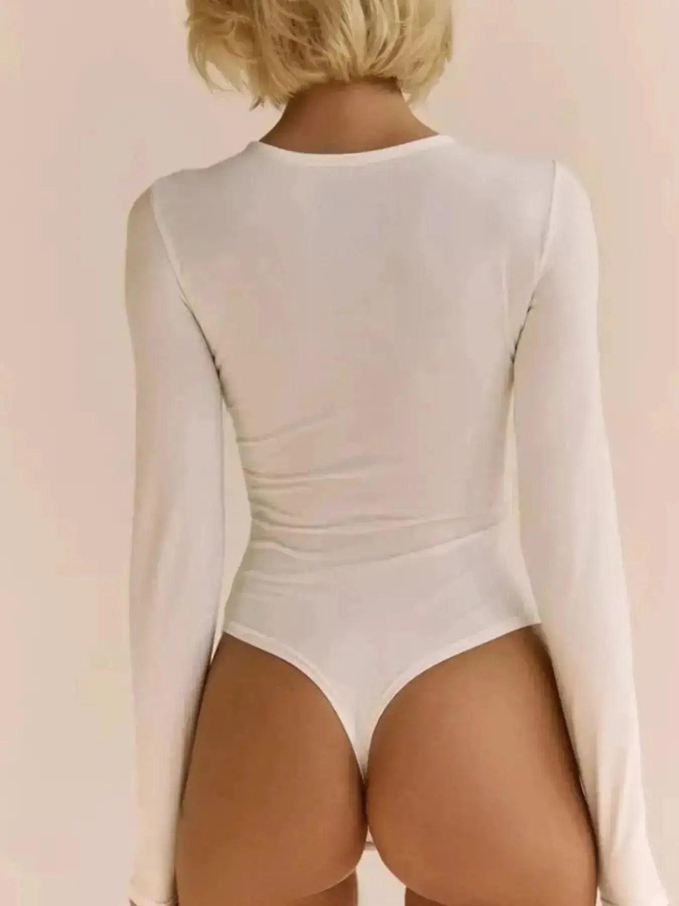 Twist Front Long Sleeve Bodysuit by Parfymia