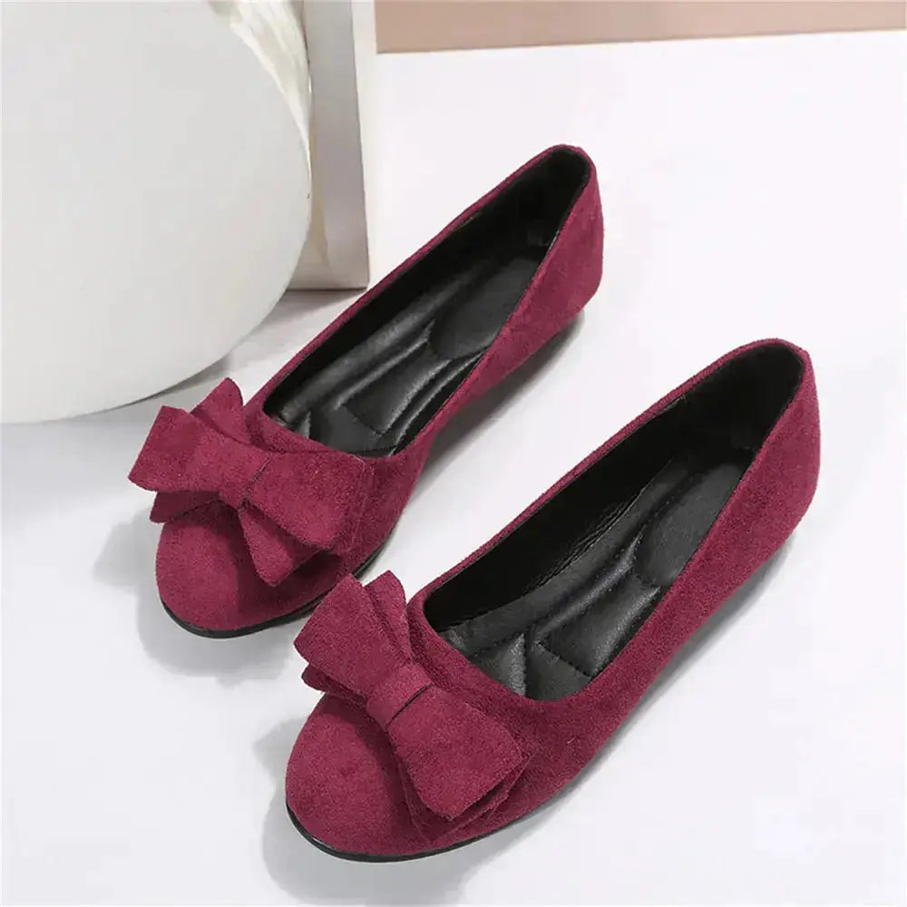Bow Accent Flat Slip-Ons in Solid Color by Parfymia