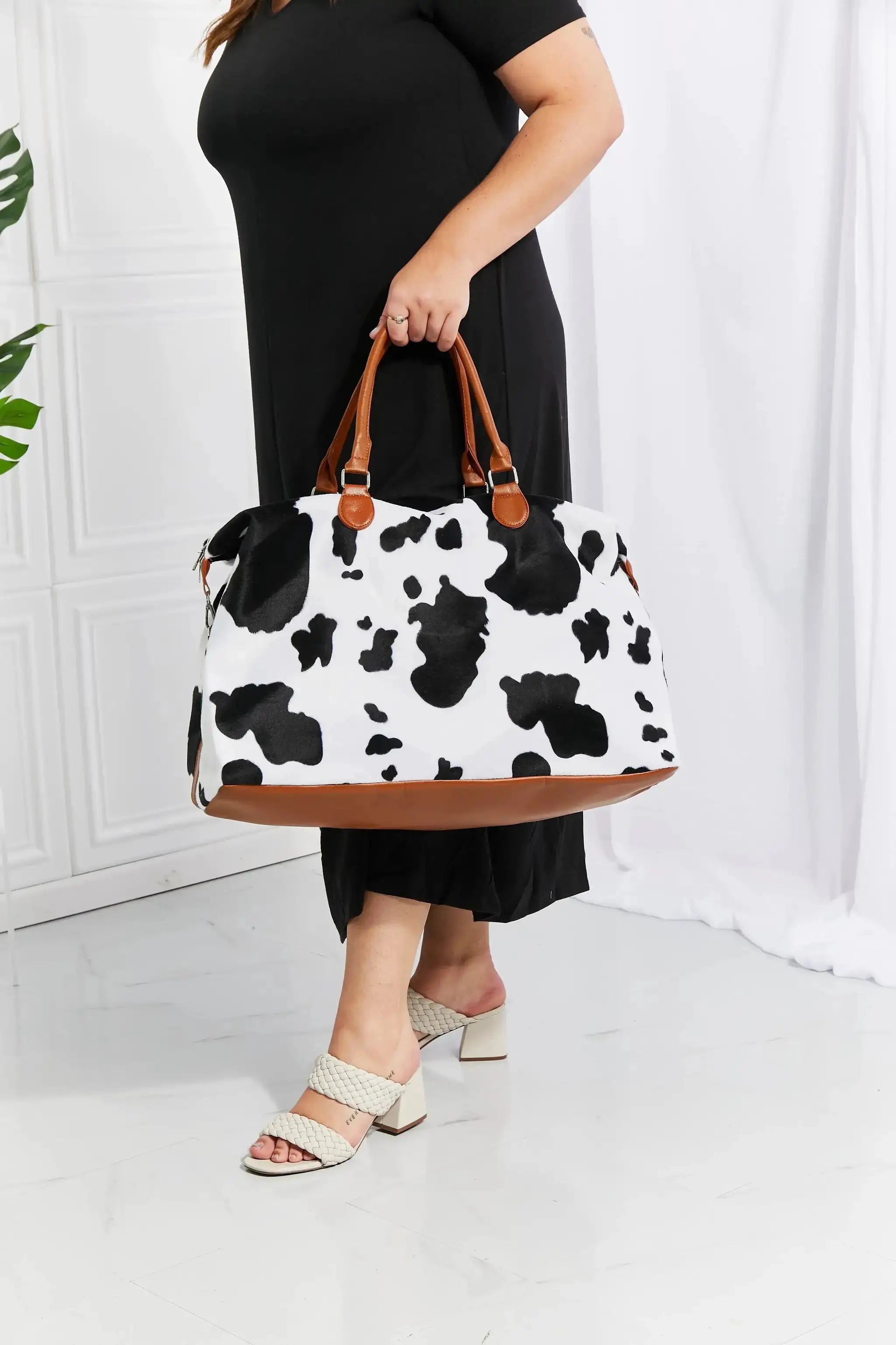 Animal Print Plush Weekender Bag by Parfymia