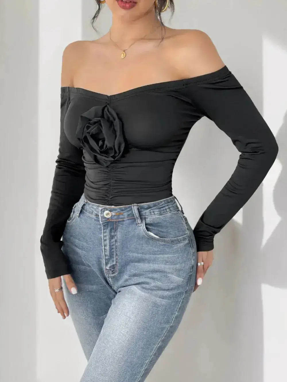 Perfee Ruched Flower Off-Shoulder Long Sleeve Bodysuit by Parfymia